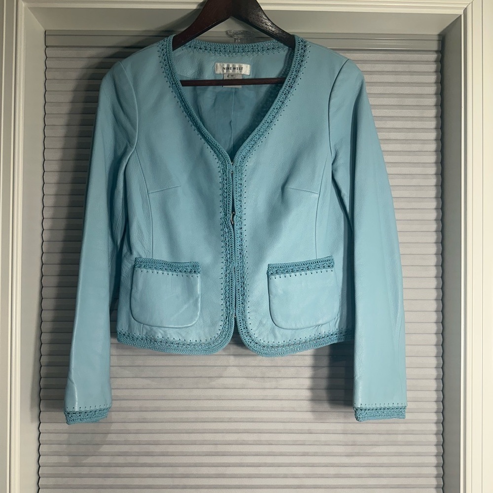 Light blue leather jacket with crochet hem